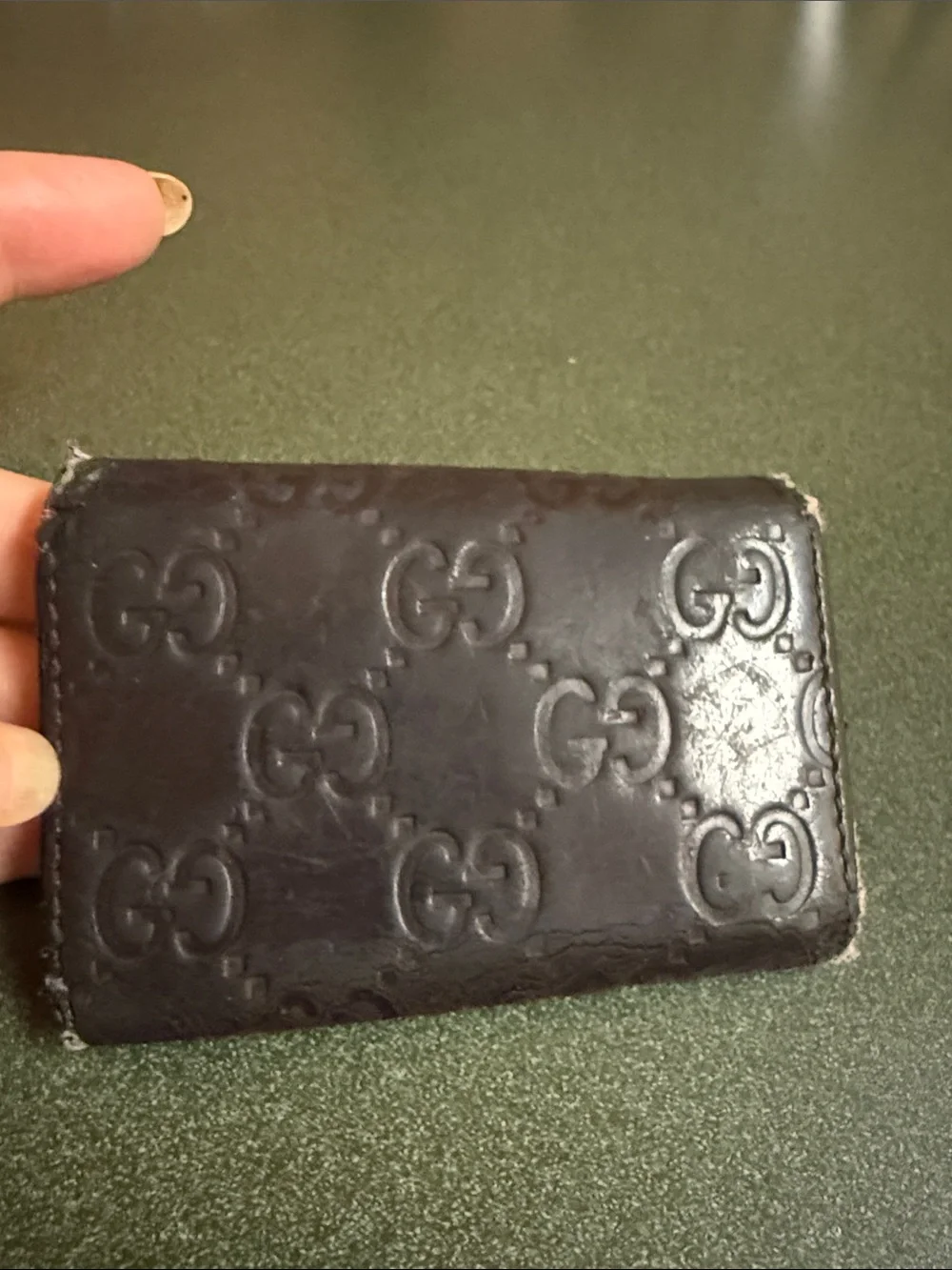 Gucci leather embossed